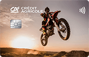 ID: CA182 – Karta Credit Agricole z wizerunkiem motocyklisty, który wykonuje skok na motocyklu crossowym, o zachodzie słońca
