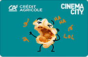 ID: CA348 – Karta Credit Agricole i Cinema City z grafiką śmiejącego się popcornu. Dookoła niego jest pomarańczowy napis „ha ha